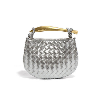 Silver woven hobo bag with gold sculptural handle
