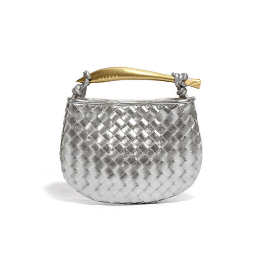 Silver woven hobo bag with gold sculptural handle