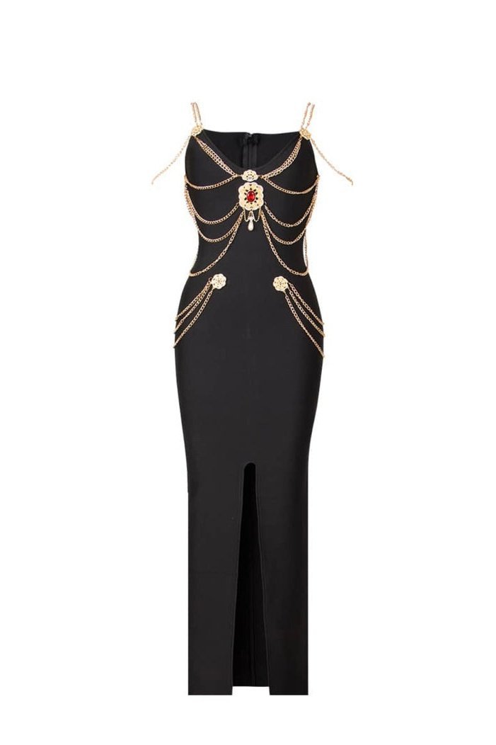 Woman wearing black bandage dress with gold chain detail