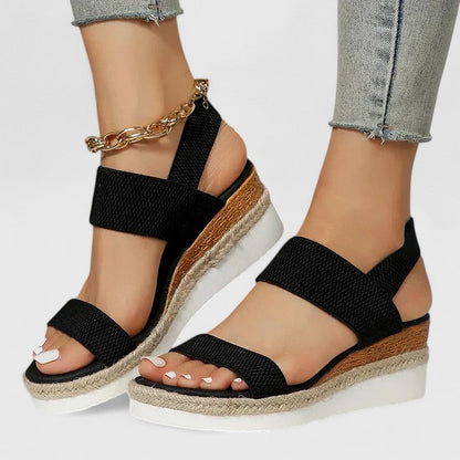 Black - Women's open-toe wedge sandals featuring stretch-fabric straps and a braided jute-trim midsole