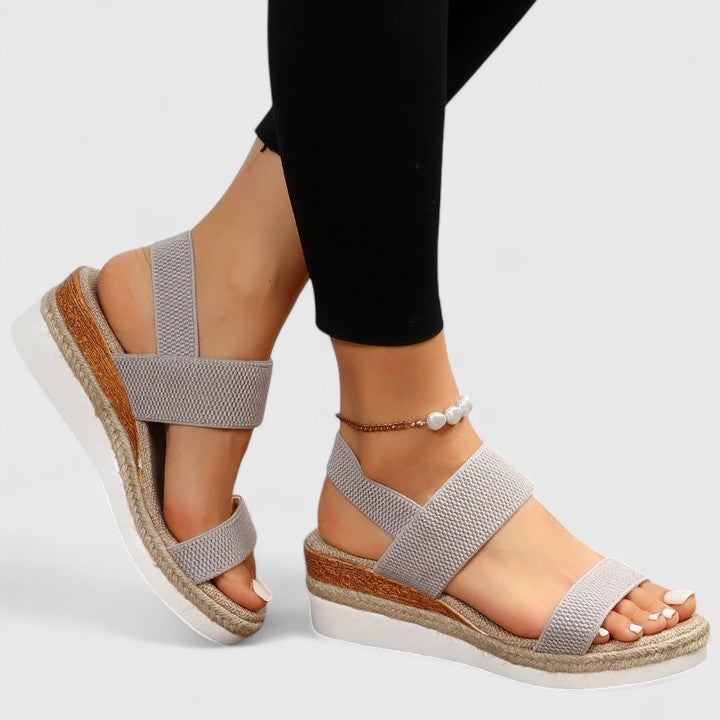Blue - Women's open-toe wedge sandals featuring stretch-fabric straps and a braided jute-trim midsole