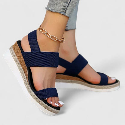Blue - Women's open-toe wedge sandals featuring stretch-fabric straps and a braided jute-trim midsole