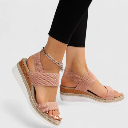Pink - Women's open-toe wedge sandals featuring stretch-fabric straps and a braided jute-trim midsole
