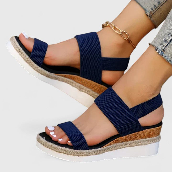Blue - Women's open-toe wedge sandals featuring stretch-fabric straps and a braided jute-trim midsole
