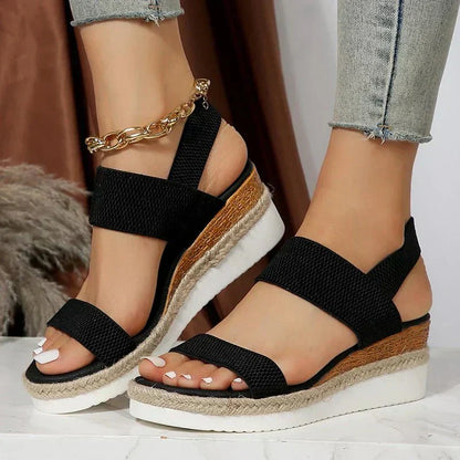 Black (Almost sold out) - Women's open-toe platform sandals featuring wide stretch-fabric straps, a cushioned footbed, and a layered sole with jute-trim detailing.