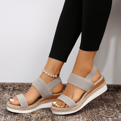 Pink - Women's open-toe platform sandals featuring wide stretch-fabric straps, a cushioned footbed, and a layered sole with jute-trim detailing.
