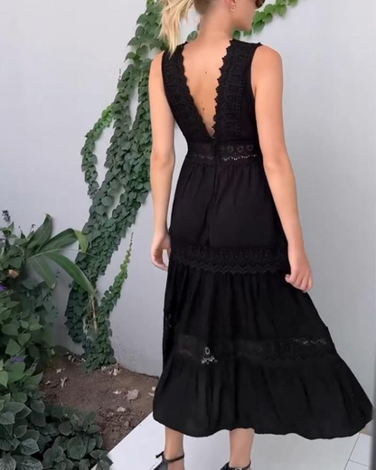 Black - Woman wearing a sleeveless V-neck tiered maxi sundress featuring intricate crochet waist paneling and trim details.