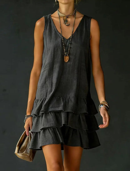 Black - Sleeveless V-neck mini dress featuring a tiered ruffle skirt in a lightweight matte fabric