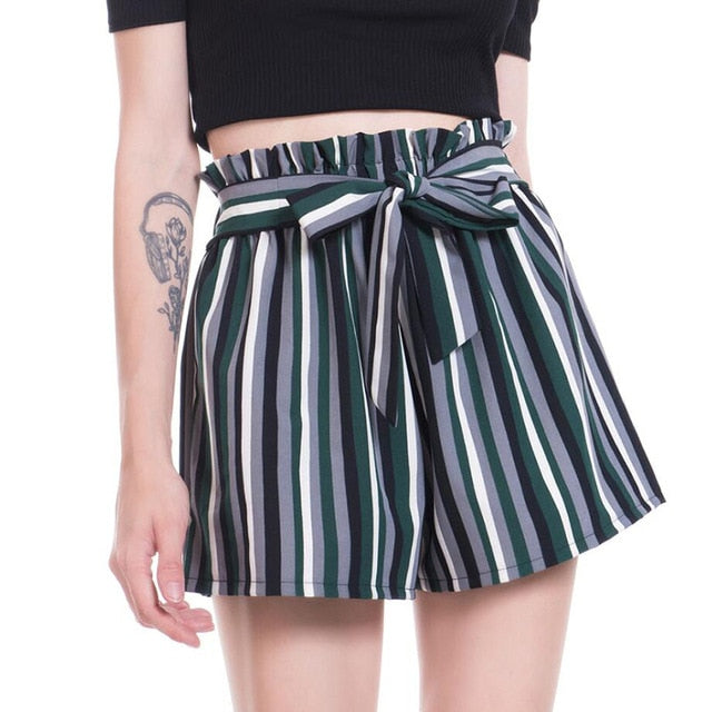 Woman wearing striped paperbag waist shorts
