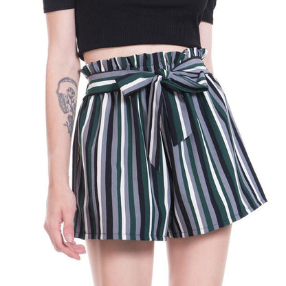 Woman wearing striped paperbag waist shorts