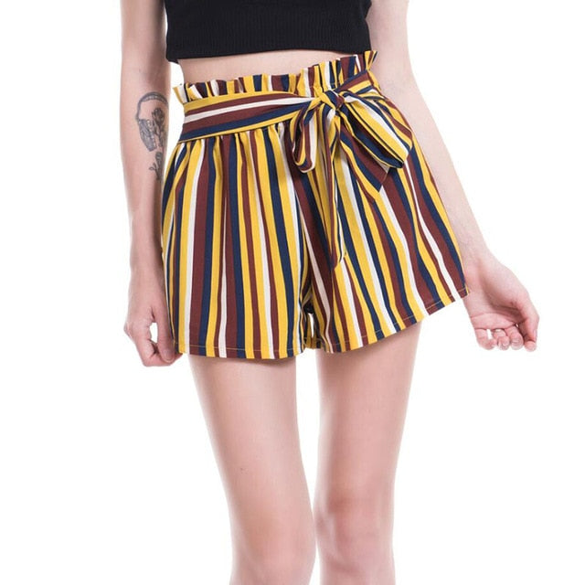 Woman wearing striped paperbag waist shorts