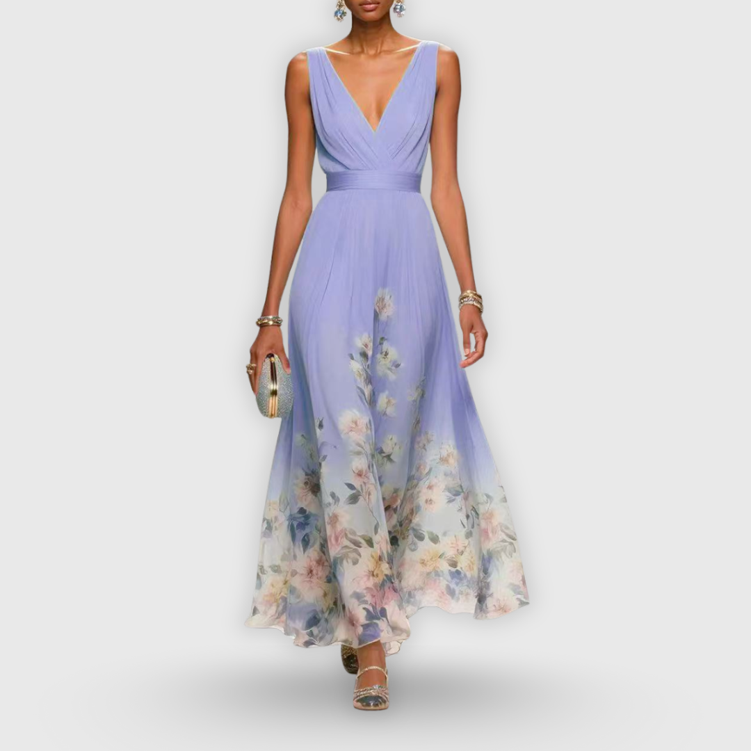Purple - A woman wearing a sleeveless light blue chiffon maxi dress with a deep V-neck, pleated bodice, and a watercolor floral print along the sweeping hemline.