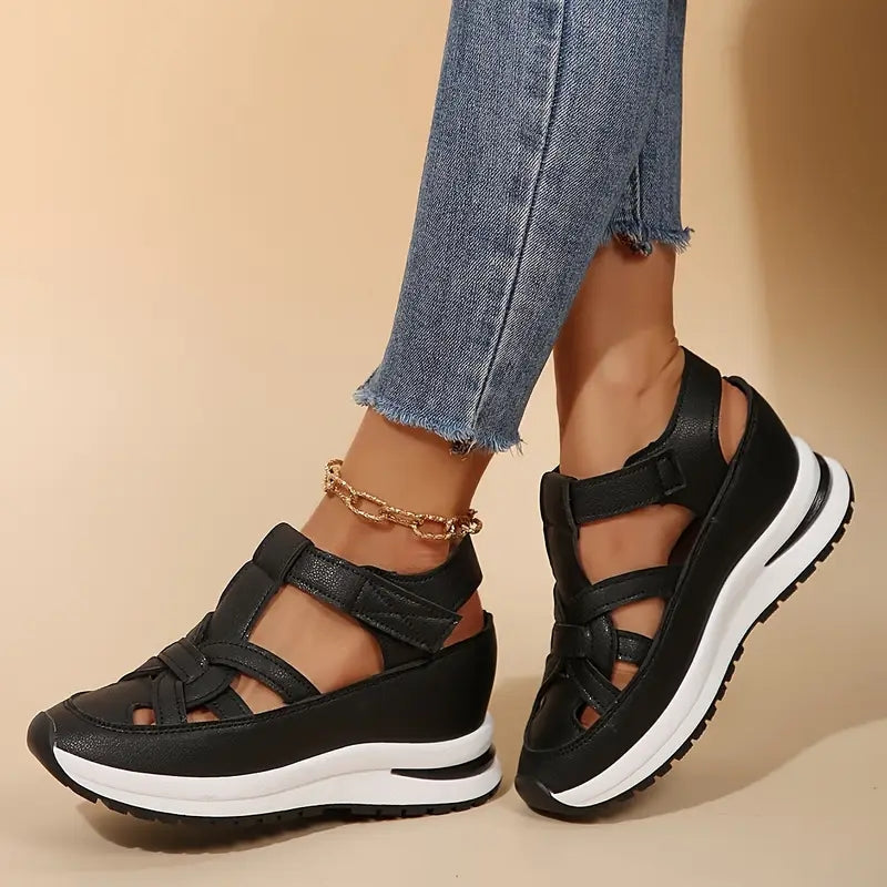 Black - Women's faux-leather platform sandals featuring a woven cutout upper design, thick shock-absorbing sole, and adjustable hook-and-loop ankle strap.