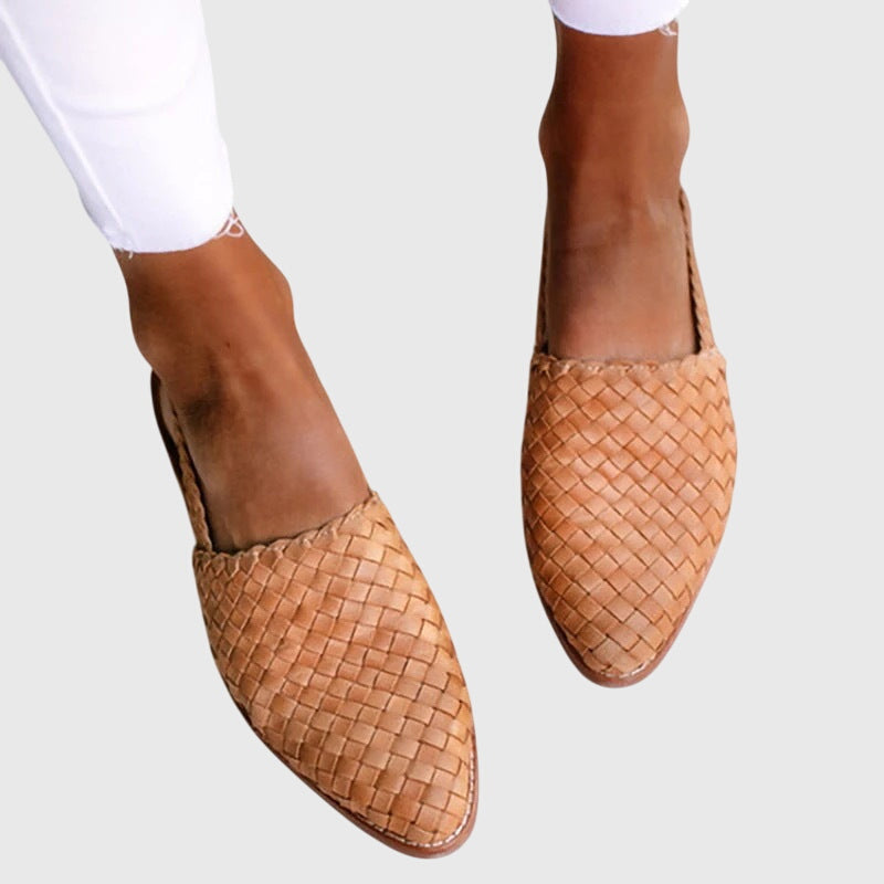 Light brown - Women's flat slip-on mules featuring a woven faux-leather upper and closed almond toe design.